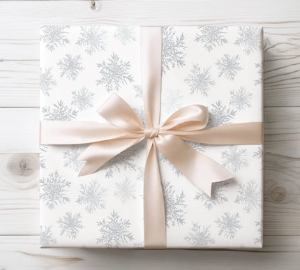 Keep it classic with FrostWhisper, a white snowflake design wrapping paper. Perfect for Christmas, winter birthdays, and seasonal gifting. 