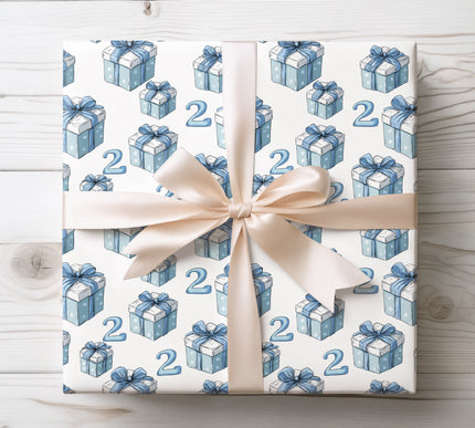 Celebrate a second birthday with Azure Two, a charming blue ribbon gift wrap with number 2 designs. Ideal for boys’ birthday presents. 