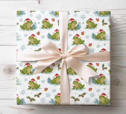 Playful and quirky, Frosttoad features frogs in Santa hats. A fun wrapping paper design for lighthearted holiday gifting. 