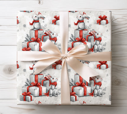 Cozy up your gifts with Snowwhisk, a wrapping paper featuring bunnies in scarves. Perfect for Christmas, winter birthdays, and festive occasions. 