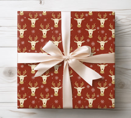 Festive and striking, Crimson Antlers features reindeer and snowflakes in bold red. A lively choice for holiday décor and gift wrapping. 