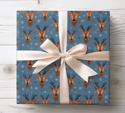 Add seasonal charm with Frosthorn, featuring reindeer heads and snowflakes in blue tones. Great for classic and cozy holiday gift wrapping. 