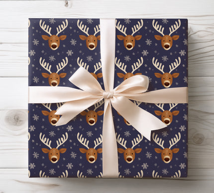 Elegant and festive, Midnight Stag features reindeer and snowflakes on a dark blue background. Perfect for sophisticated Christmas gifting. 