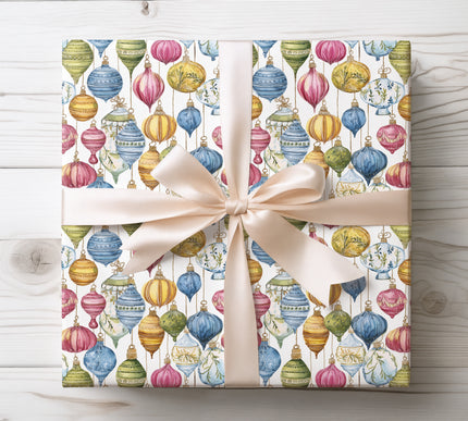 Artistic and festive, Bauble Bloom features watercolor Christmas ornaments. A stylish design for elegant and cheerful holiday gift wrapping. 