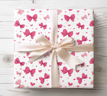 Add sweetness with Rosaline Charm, a wrapping paper featuring pink bows and hearts. Perfect for Valentine’s Day, anniversaries, or romantic birthdays. 