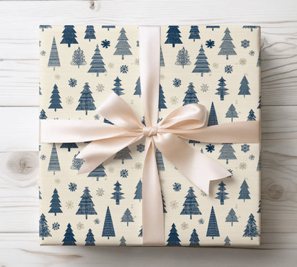 Capture the magic of winter with Frostpine Whispers, a festive blue Christmas tree and snowflake wrapping paper. Perfect for holiday gifts, winter birthdays, and seasonal décor. Durable and tear-resistant for flawless wrapping. 