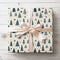 Capture the magic of winter with Frostpine Whispers, a festive blue Christmas tree and snowflake wrapping paper. Perfect for holiday gifts, winter birthdays, and seasonal décor. Durable and tear-resistant for flawless wrapping. 