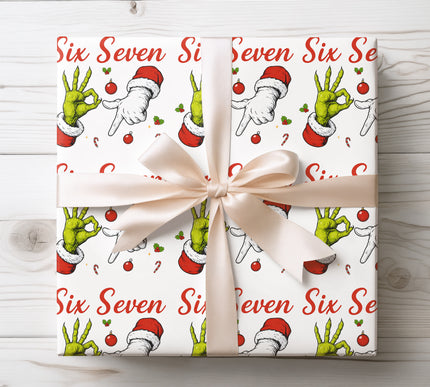 Funny Grinch-style Six Seven wrapping paper for Christmas birthdays or anniversary gifts. A playful and bold design perfect for those with a sense of humor. Great for holiday celebrations and personalized presents. Printed and shipped fast from the USA. 