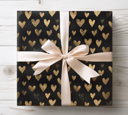 Gold foil distressed hearts on black background wrapping paper 