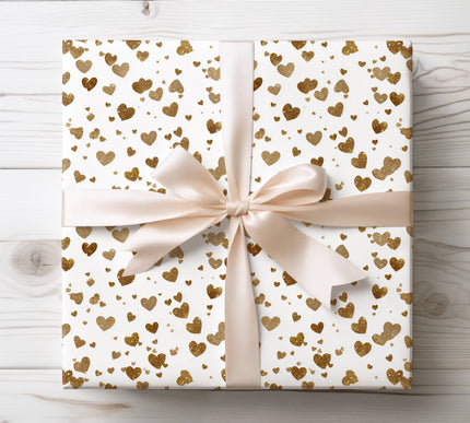 Golden glitter hearts and dots on white background wrapping paper 