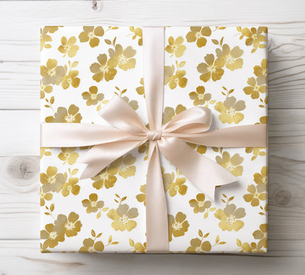 Minimalistic gold foil floral seamless pattern on white wrapping paper 
