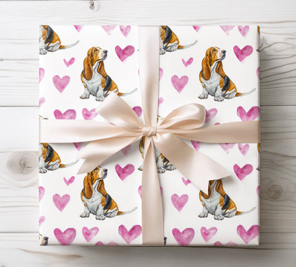 Artistic Basset Hound wrapping paper featuring a sweet watercolor Basset Hound portrait surrounded by soft heart motifs. Designed for dog lovers, pet parents, anniversaries, and romantic occasions. Seamless Basset Hound dog breed wrapping paper with an elegant watercolor style. 