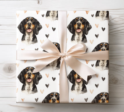 Striking Black and Tan Coonhound wrapping paper showcasing a detailed watercolor dog portrait with warm neutral and charcoal heart accents on a clean white background. Ideal for dog lovers, romantic gifts, Valentine’s Day, birthdays, anniversaries, or everyday gifting. This Black and Tan Coonhound watercolor wrapping paper brings a bold, elegant, and heartfelt finish to every gift. 