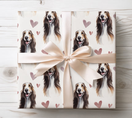 Luxury Afghan Hound dog wrapping paper featuring graceful watercolor portraits with soft rose and blush hearts on a warm light background. Perfect gift wrap for Afghan Hound lovers, dog moms and dog dads, Valentine’s Day, anniversaries, birthdays, and elegant pet-themed gifts. High-quality wrapping paper with a refined, romantic aesthetic. 