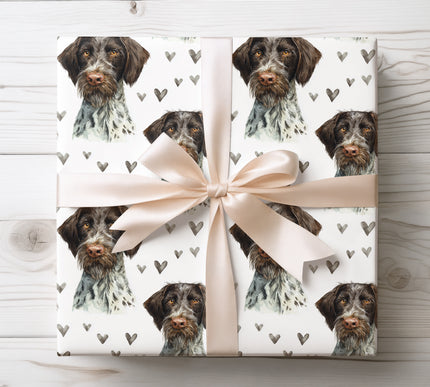 Premium German Wirehaired Pointer wrapping paper featuring realistic watercolor German Wirehaired Pointer portraits with soft neutral heart accents on a clean white background. Perfect gift wrap for German Wirehaired Pointer owners, dog lovers, Valentine’s Day, birthdays, and elegant pet-themed gifts. High-quality wrapping paper with a natural, refined, and timeless design. 
