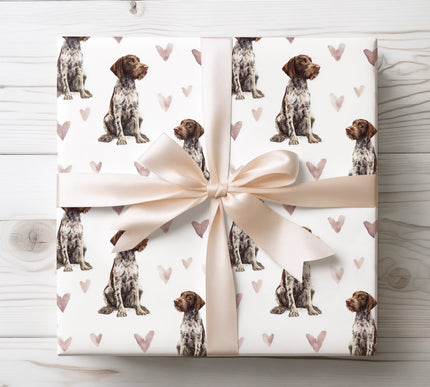 Premium German Wirehaired Pointer wrapping paper featuring realistic watercolor German Wirehaired Pointer illustrations with soft blush heart accents on a clean white background. Perfect gift wrap for German Wirehaired Pointer owners, dog lovers, Valentine’s Day, birthdays, and tasteful pet-themed gifts. High-quality wrapping paper with a warm, natural, and timeless design. 
