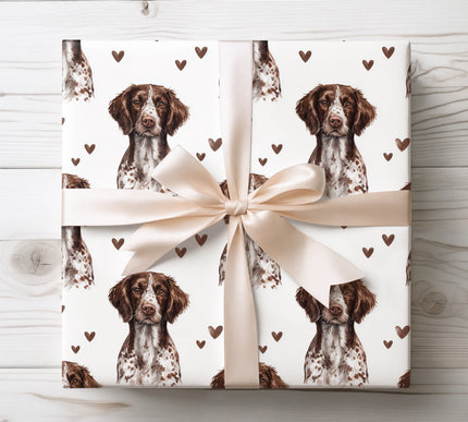 Premium watercolor wrapping paper showcasing realistic Small Munsterlander Pointer portraits paired with subtle heart accents. Clean white background and seamless design make it ideal for dog lovers, romantic gifts, Valentine’s Day, special occasions, and elegant wrapping. 