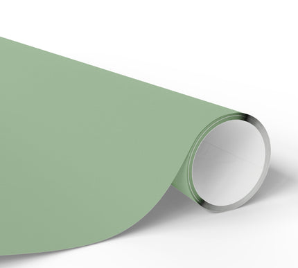 Embrace soft sophistication with Sage Whisper, a solid light sage green wrapping paper. Perfect for weddings, anniversaries, or understated holiday elegance. Its muted earthy tone makes it a versatile wrap for any celebration. 